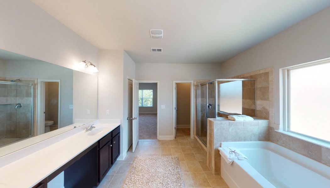 Furnished interior in a model home at Cove Lake Estates in Conley (Image 15).