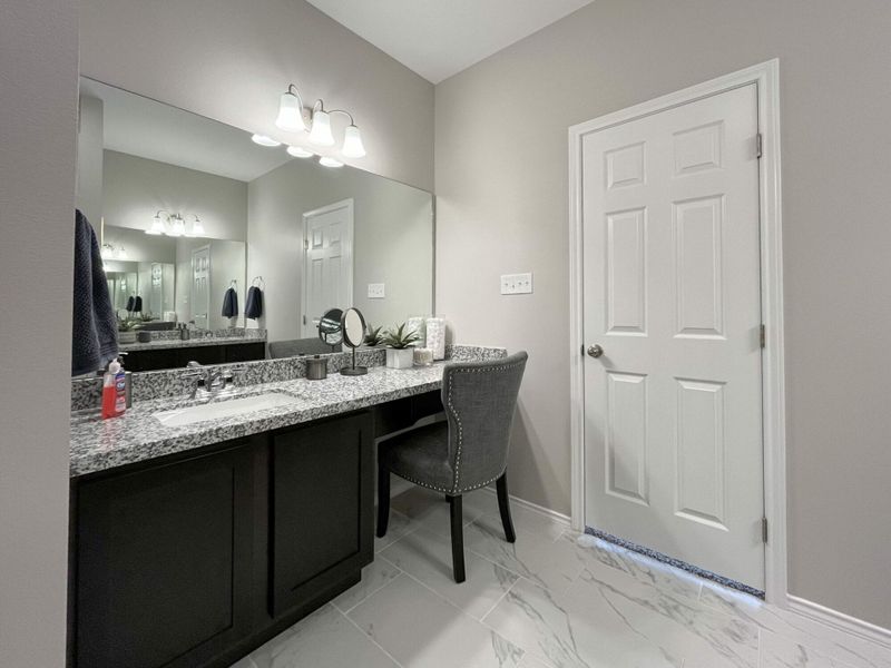 Furnished interior in a model home at Villas San Agustin in Laredo (Image 17).