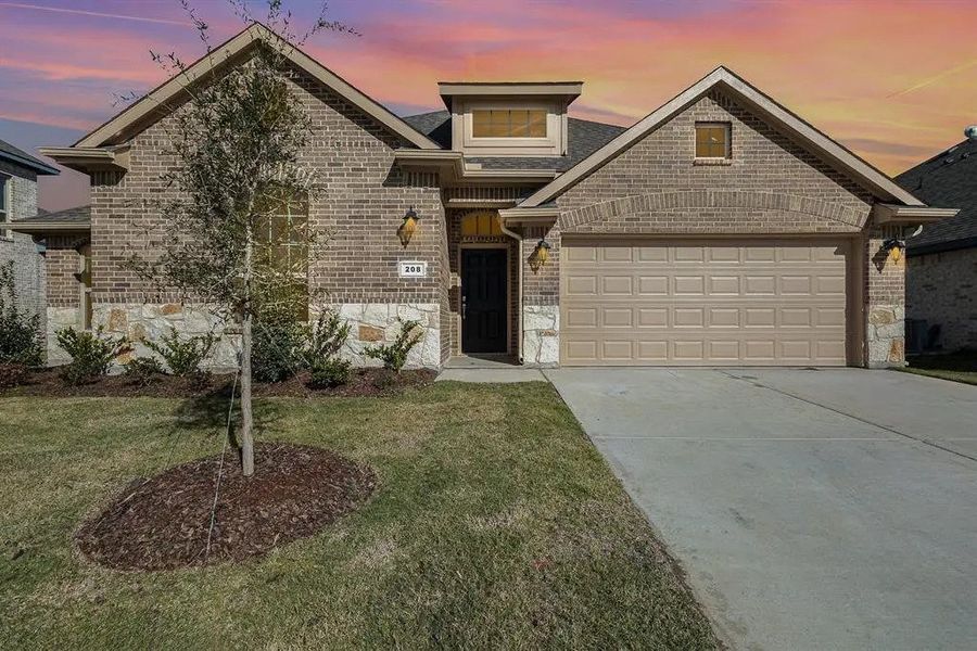 Front exterior of a home in the Mustang Place II community, located in Forney, TX (Image 6).