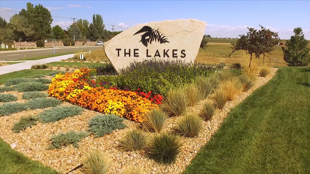 Entrance to the The Lakes at Centerra community in Loveland, CO, featuring signage and landscaping (Image 2).