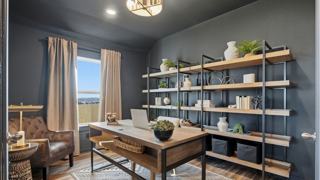 Experience elegance with this Infinity Square home featuring exquisite brickwork and a gabled roof.