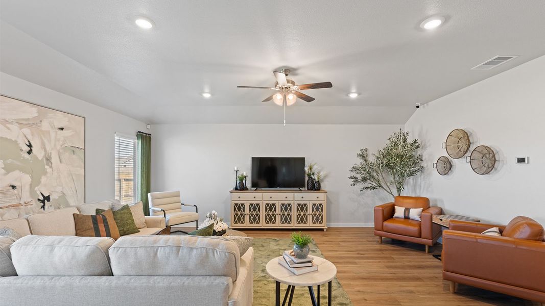 Furnished interior in a model home at King's Landing in Corpus Christi (Image 9).