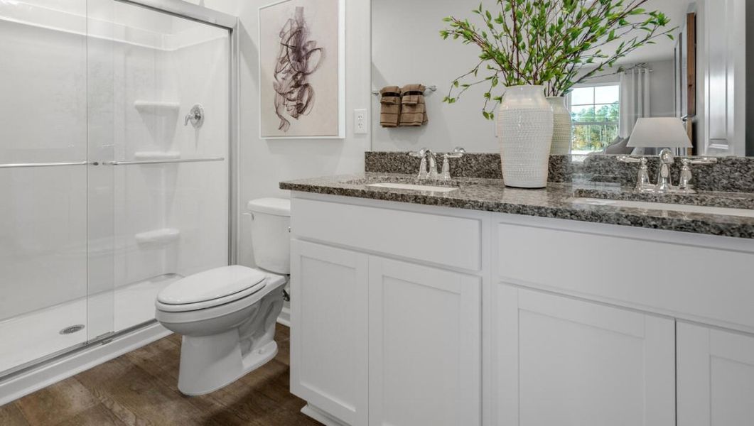 Furnished interior in a model home at Waterside Townhomes in Surf City (Image 19).