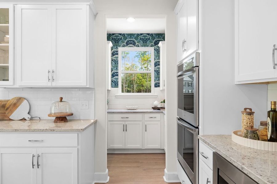 Furnished interior in a model home at Ramsey Landing in Rincon (Image 13).