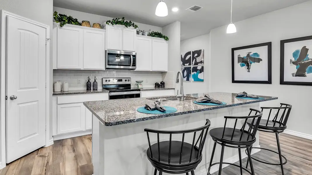 Furnished interior in a model home at Three Creeks - Colt Creek in Belton (Image 7).