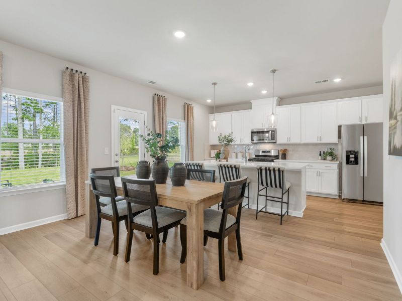 Furnished interior in a model home at Northwoods at Mirror Lake in Villa Rica (Image 5).