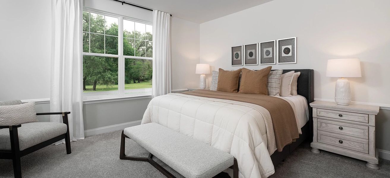 Furnished interior in a model home at Stewart's Glen | 55+ Community in Smyrna (Image 8).