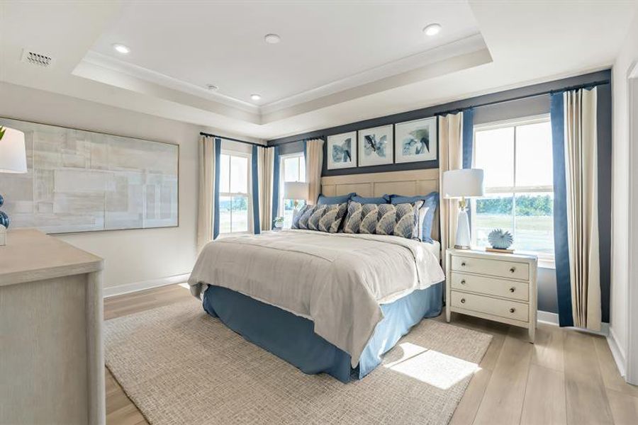 EXPERIENCE THE EASE OF FIRST-FLOOR LIVING WITH A SPACIOUS OWNER'S SUITE