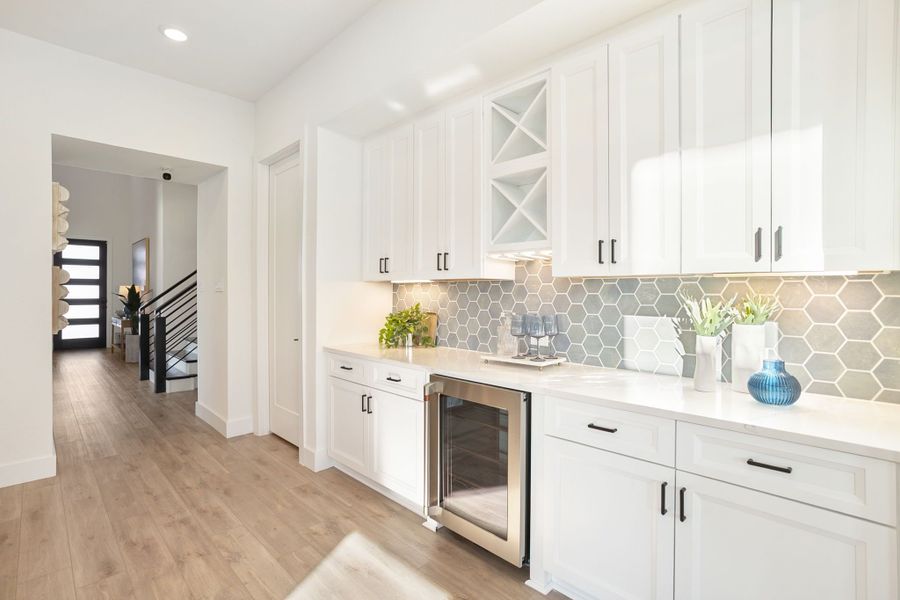 Furnished interior in a model home at Lily Creek at Sutton Fields in Aubrey (Image 63).