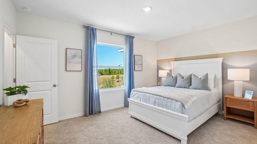 Furnished interior in a model home at Sanctuary at Citrus Park Townhomes in Tampa (Image 27).
