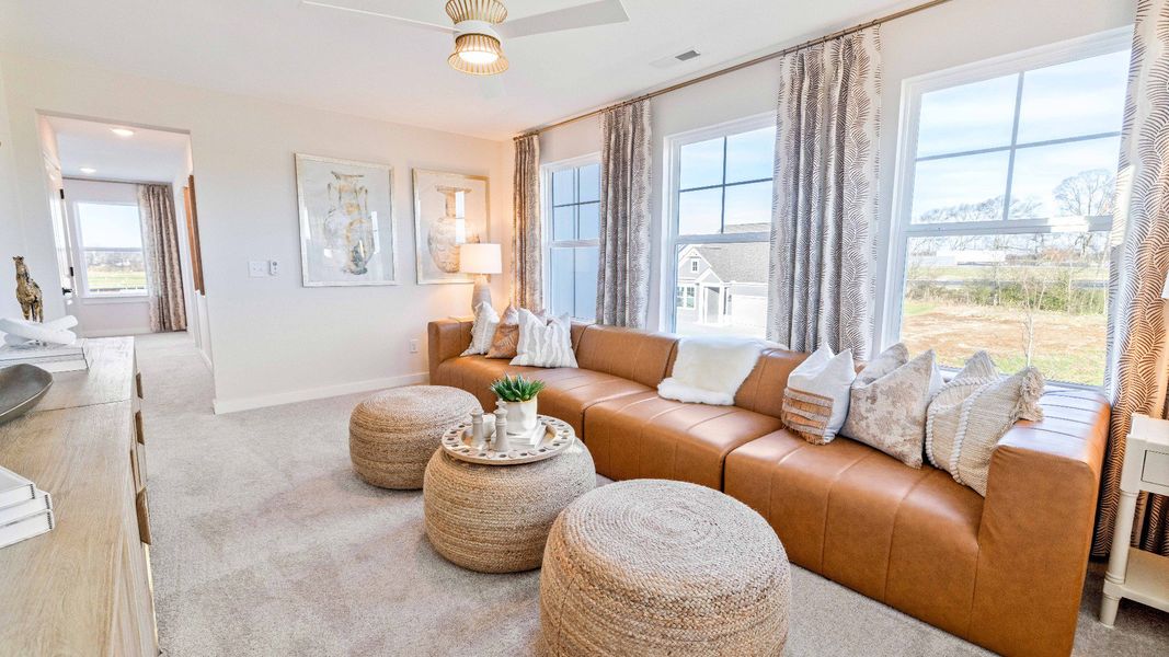 Furnished interior in a model home at Cottages of Bearwood in Mount Pleasant (Image 2). Furnished interior in a model home at Cottages of Bearwood in Mount Pleasant (Image 2).