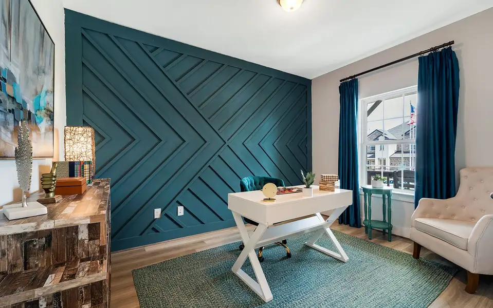 Furnished interior in a model home at Hunter's Ranch in San Antonio (Image 4).