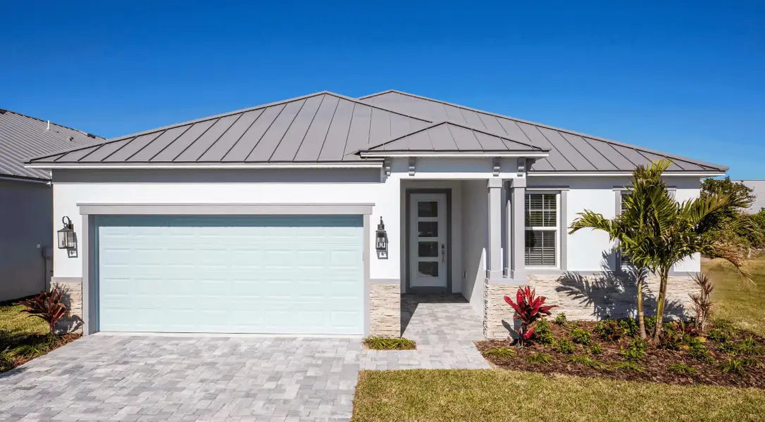 Front exterior of a home in the The Vue community, located in Satellite Beach, FL (Image 3).