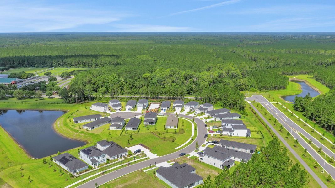 Aerial view of the Amberly community in Green Cove Springs, FL, showing layout and nearby surroundings (Image 11). Aerial view of the Amberly community in Green Cove Springs, FL, showing layout and nearby surroundings (Image 11).