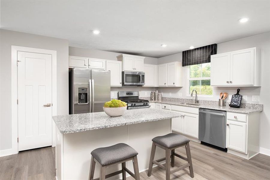 Furnished interior in a model home at Heritage Grove Ranch in Calhoun (Image 9).