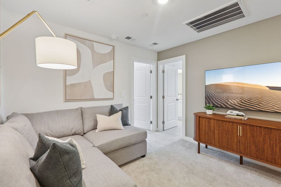 Furnished interior in a model home at Cedarcrest Townhomes in Fairview (Image 16).