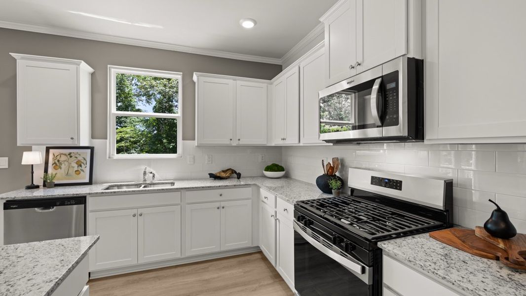 Furnished interior in a model home at Northwoods at Mirror Lake in Villa Rica (Image 18).