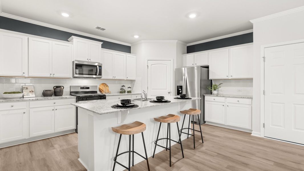 Furnished interior in a model home at Sheffield Highlands in Dallas (Image 7).