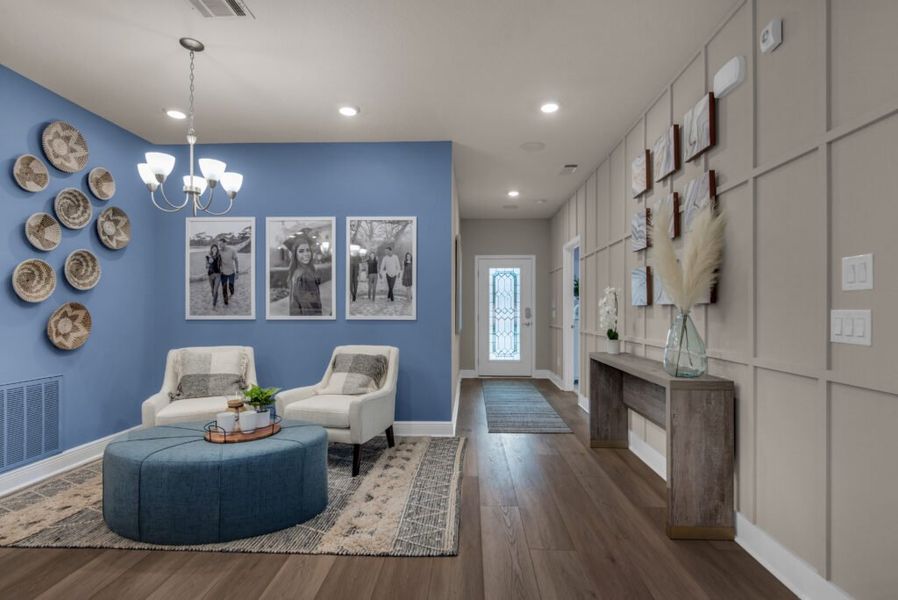 Furnished interior in a model home at Southern Palms in Pace (Image 7).