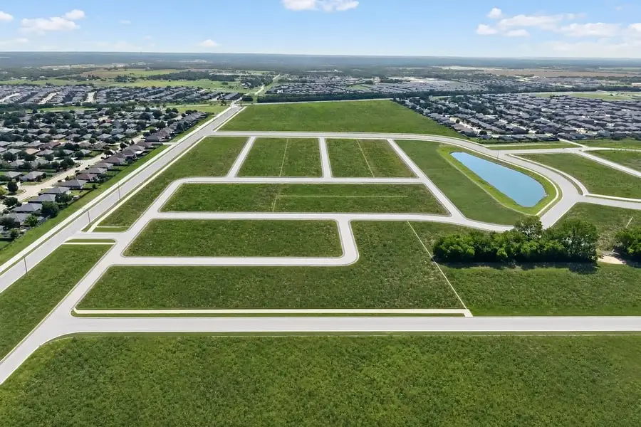 Aerial view of the The Landing at Lindsey Lane community in Anna, TX, showing layout and nearby surroundings (Image 1). Aerial view of the The Landing at Lindsey Lane community in Anna, TX, showing layout and nearby surroundings (Image 1).