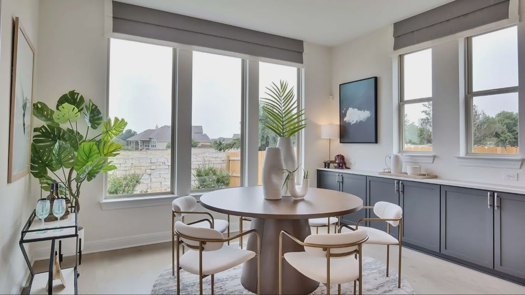 Furnished interior in a model home at Oaks at San Gabriel in Georgetown (Image 13).