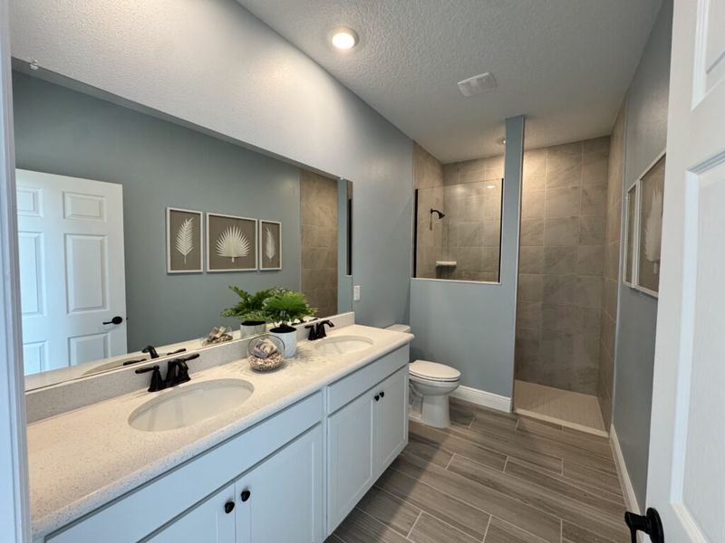 Furnished interior in a model home at Huntington Park in Titusville (Image 32). Furnished interior in a model home at Huntington Park in Titusville (Image 32).