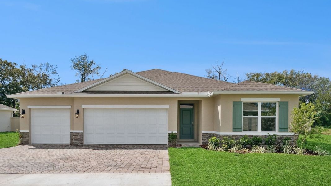 Front exterior of a home in the Wexford Cove community, located in Ormond Beach, FL (Image 2). Front exterior of a home in the Wexford Cove community, located in Ormond Beach, FL (Image 2).