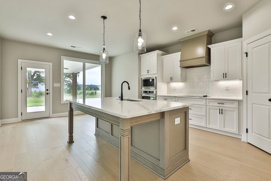 Furnished interior in a model home at Grove Park in Senoia (Image 6).