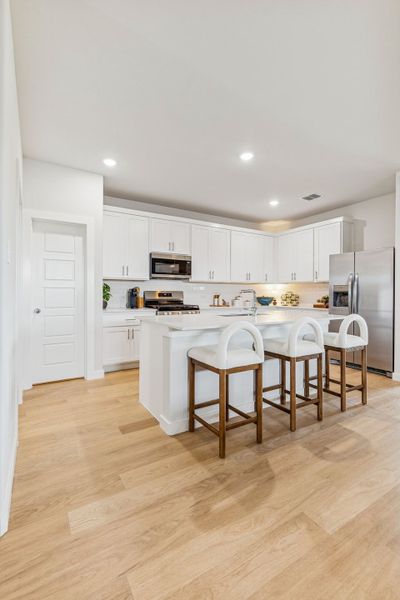 Kitchen in a Terra Vella Hayden Model Home in Fort Worth TX by Trophy Signature Homes