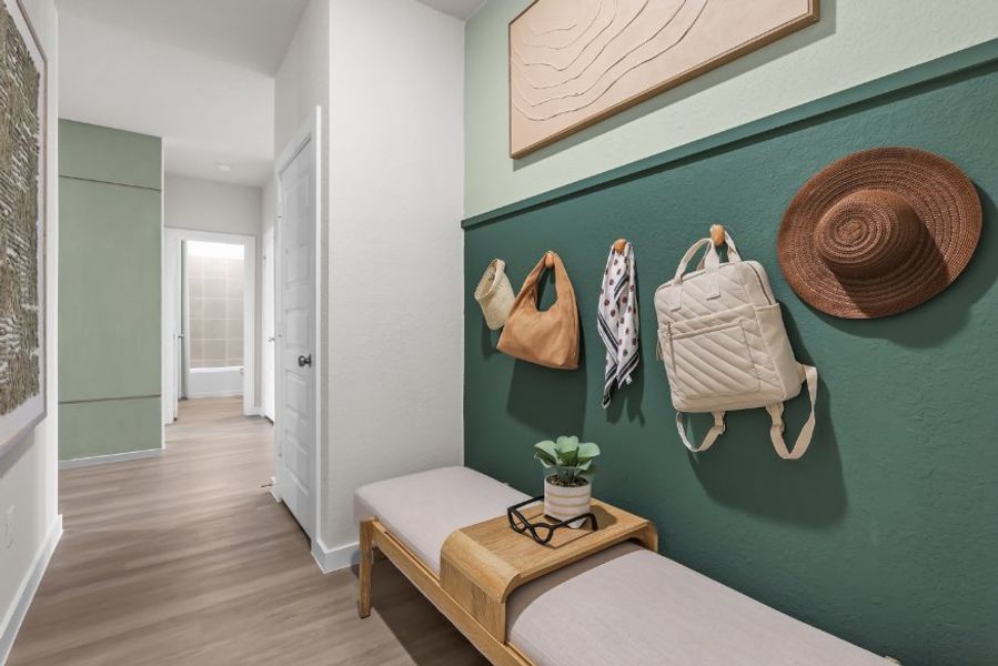 A room with a bench and a hat on the wall. A room with a bench and a hat on the wall.