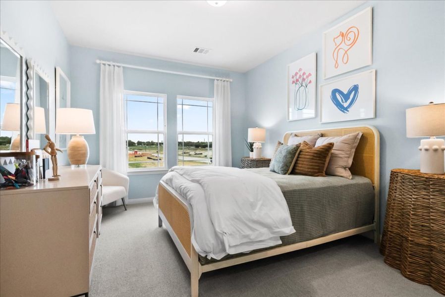 Furnished interior in a model home at The Reserve at Spiritas Ranch in Little Elm (Image 33).