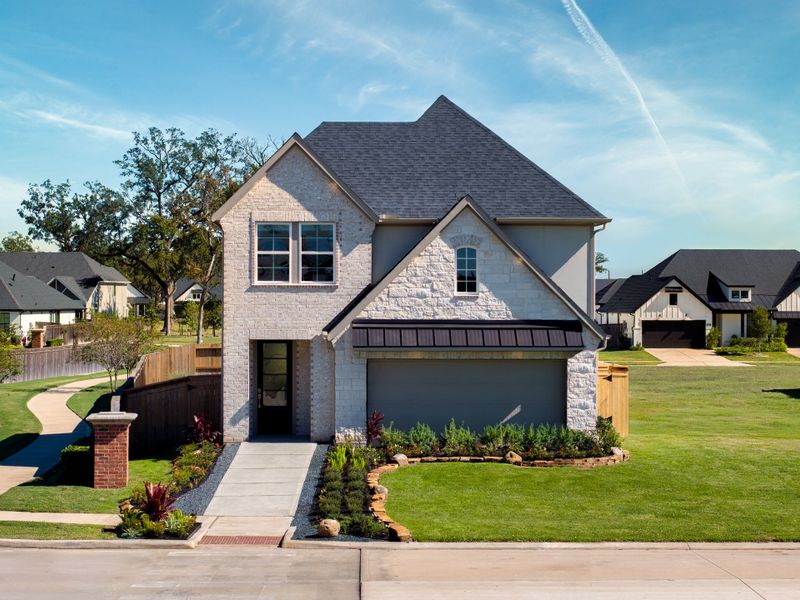 Front exterior of a home in the Sienna: Signature Series community, located in Missouri City, TX (Image 2). Front exterior of a home in the Sienna: Signature Series community, located in Missouri City, TX (Image 2).