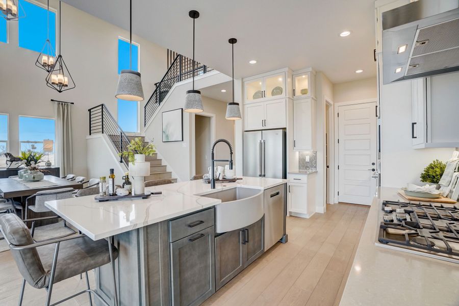 Furnished interior in a model home at Kitchel Lake at Serratoga Falls in Timnath (Image 41).