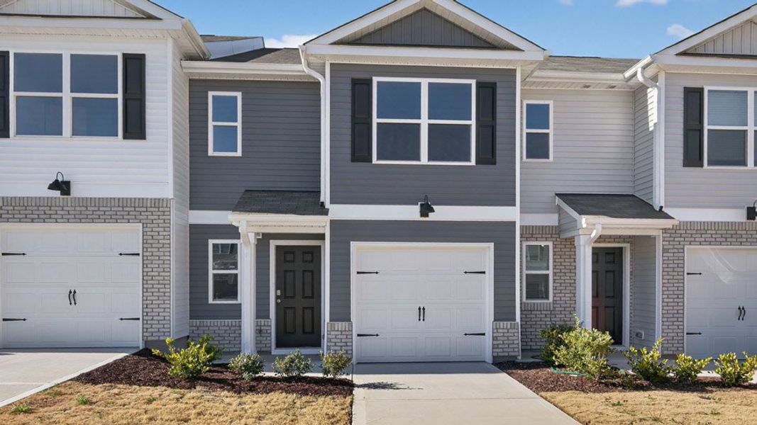 Front exterior of a home in the The Townes at Martin Farms community, located in Aberdeen, NC (Image 9).