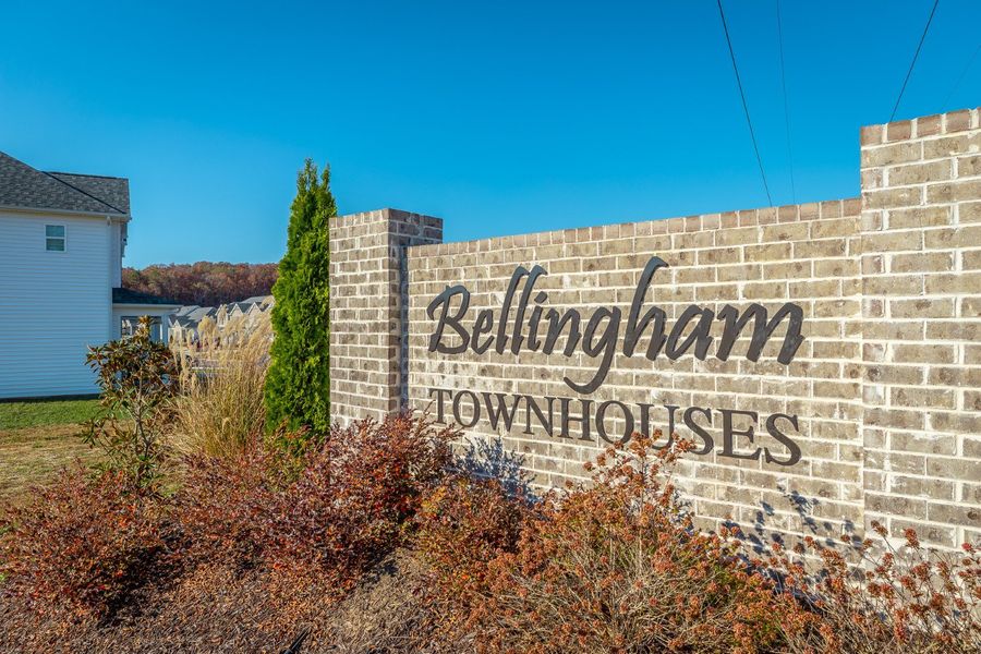 Entrance to the Bellingham Townhomes community in Cleveland, TN, featuring signage and landscaping (Image 2).