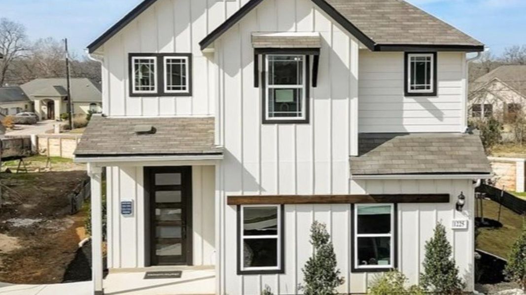 Front exterior of a home in the Casinas at Gruene community, located in New Braunfels, TX (Image 2).