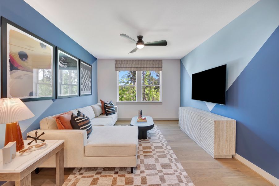Furnished interior in a model home at The Woodlands Hills - Premier Collection in Willis (Image 23).