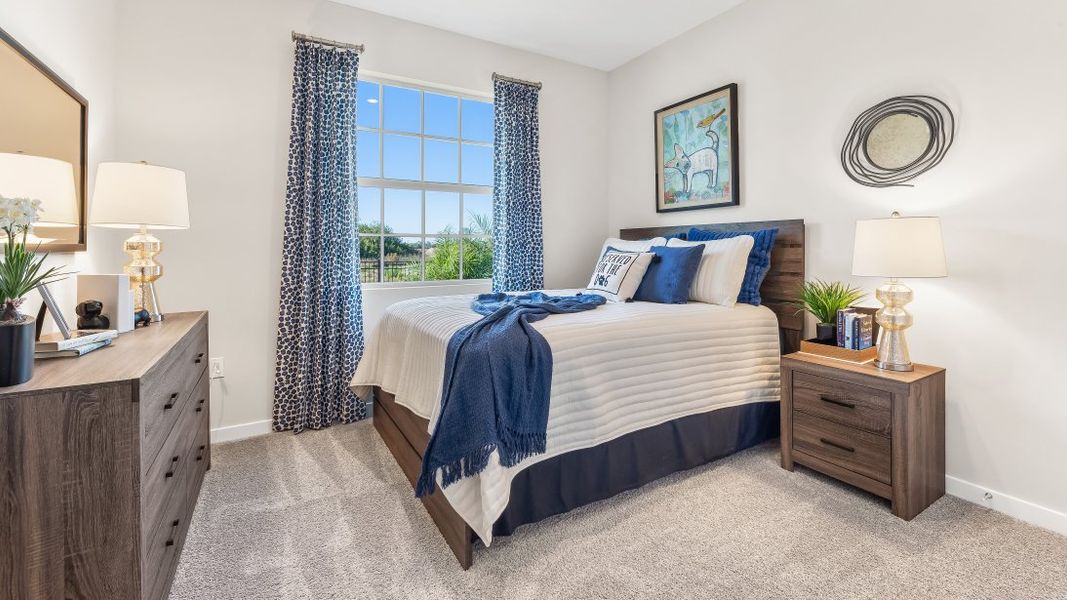 Furnished interior in a model home at Coral Lakes - Tradition & Express in Punta Gorda (Image 22).