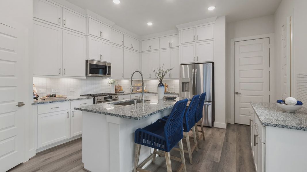 Furnished interior in a model home at Shady Acres in Houston (Image 5).
