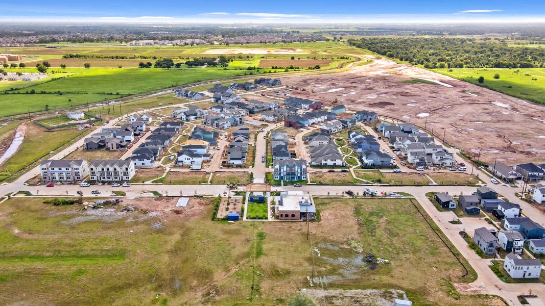 Aerial view of the Indigo: 40ft. lots community in Richmond, TX, showing layout and nearby surroundings (Image 17). Aerial view of the Indigo: 40ft. lots community in Richmond, TX, showing layout and nearby surroundings (Image 17).