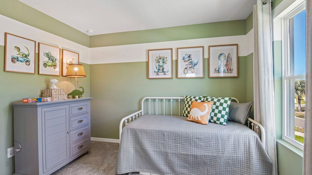 Furnished interior in a model home at Sanctuary at Citrus Park Townhomes in Tampa (Image 24).