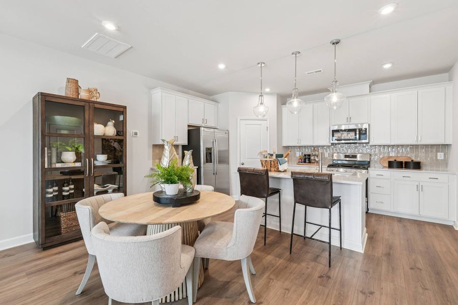 Furnished interior in a model home at Mews at Holding Village in Wake Forest (Image 52).