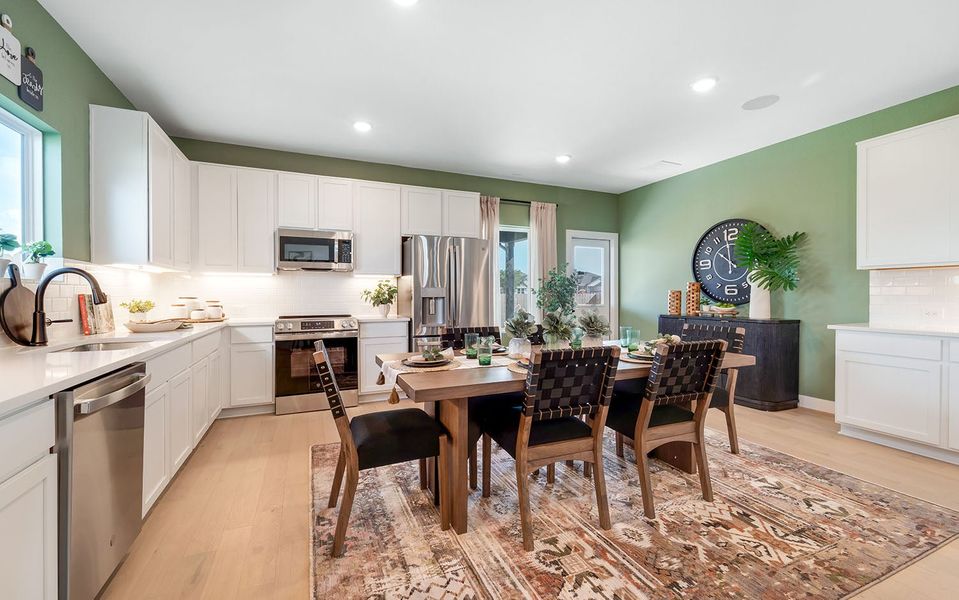 Furnished interior in a model home at Grande Estates in Bertram (Image 23).