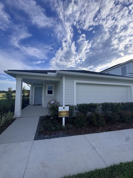 A charming single-story home with a welcoming porch in Amberly by Dream Finders Homes (Green Cove Springs, FL). A charming single-story home with a welcoming porch in Amberly by Dream Finders Homes (Green Cove Springs, FL).