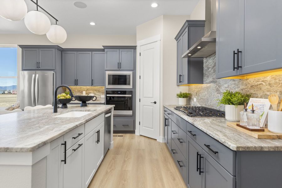 Plan C411 - American Legend Homes' Model in Sterling Ridge - Kitchen