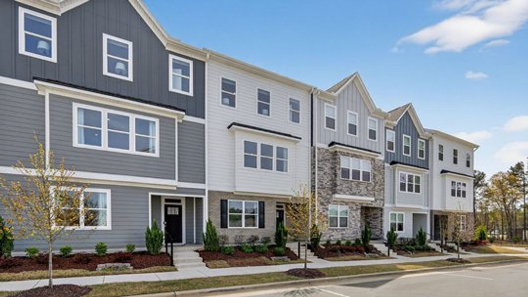 Front exterior of a home in the The Townes at Madden West community, located in Fuquay Varina, NC (Image 20).