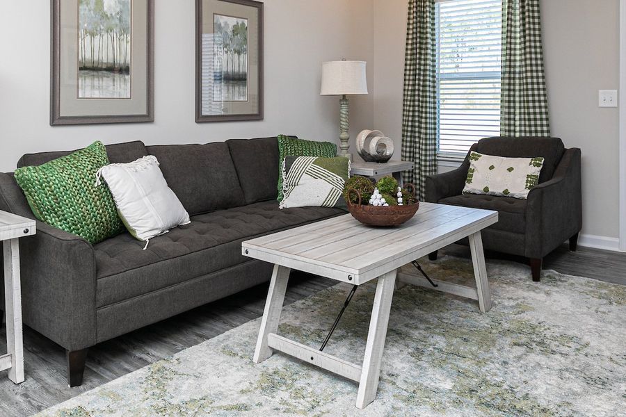 Furnished interior in a model home at The Cottages of Silvertown in Thomaston (Image 30).
