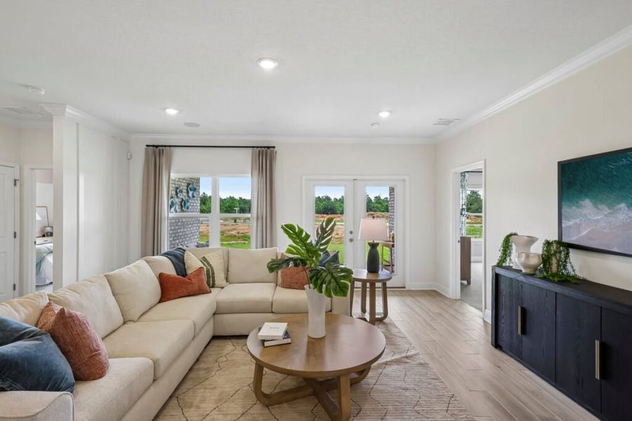 Furnished interior in a model home at Mahogany At Jubilee in Pace (Image 27).