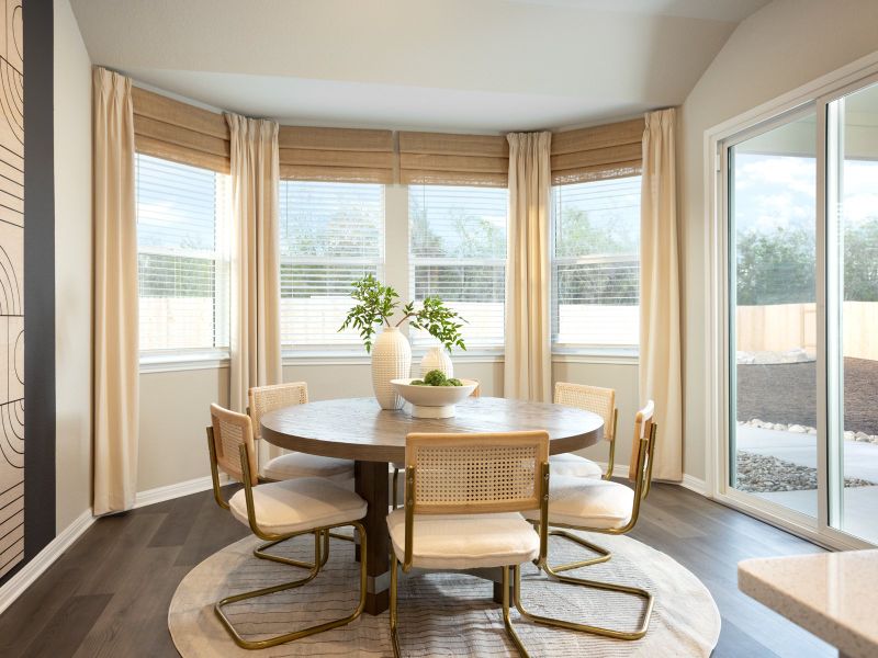 Get lots of natural light in this rounded dining room.