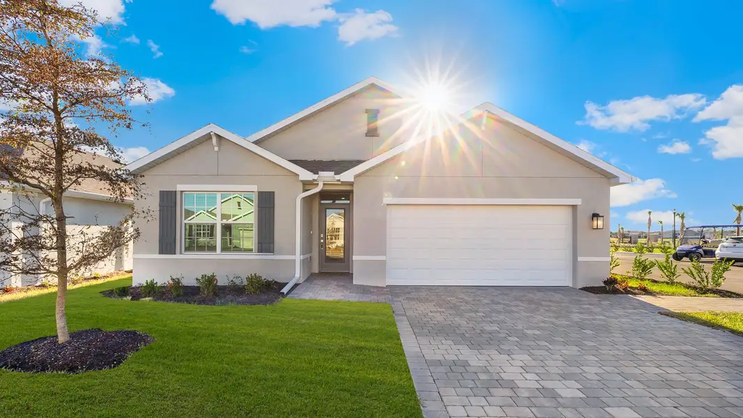 Front exterior of a home in the Bentley Crossing community, located in Fort Myers, FL (Image 12).
